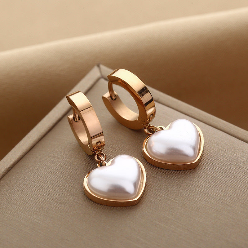 Aretes de perla en forma de corazón + Acero inoxidable
